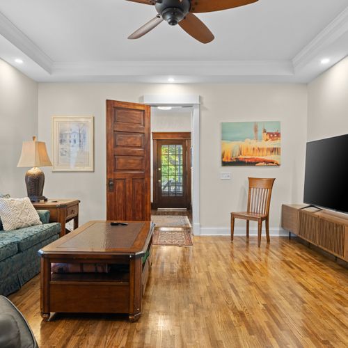 OVERVIEW:  The home has a very stylish living room with a very large live-streaming television.