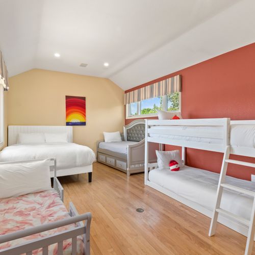 Multiple beds in the third room make it perfect for group stays or family fun.