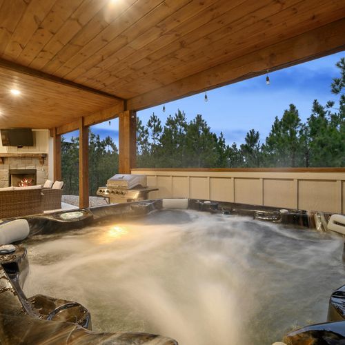 A hot tub to relax under the stars.