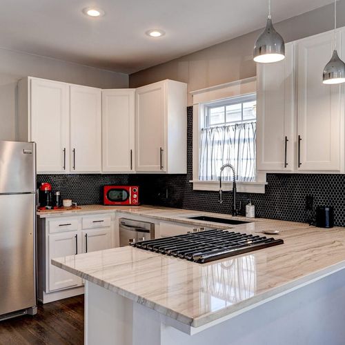 Functional kitchen w/ ample counter space & modern appliances.