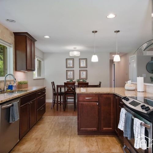 Gather around the kitchen and dining area for meals and good company.