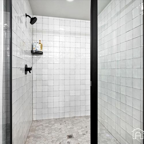 Enjoy the convenience of a private bathroom with a walk in shower and large walk-in closet.