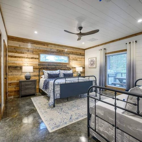 Main Level King suite (2) w/attached ultra-lux oversized private bath & Daybed
