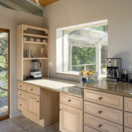 Large gourmet kitchen with counter dining., modern kitchen equipments