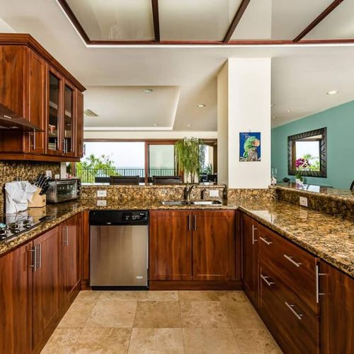 This kitchen has plenty of counter space to cook up a delicious meal.