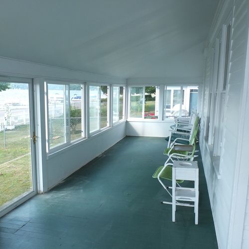 Overview:  the large, fun, and fully-enclosed front porch.