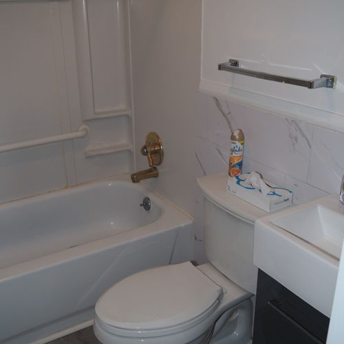 Bathroom:  the cottage has a full bathroom that includes a combination tub and shower.