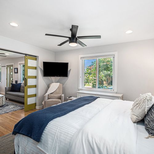 Wake up refreshed in the serene and stylish master bedroom.