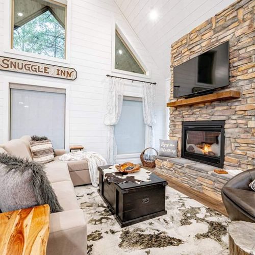 This living room has a Queen sofa sleeper for extra comfort.