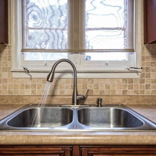 All the fully stocked kitchen conveniences of home
