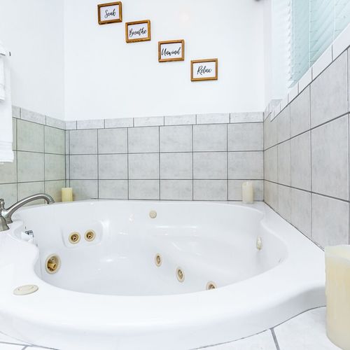 Bathroom #2 (second floor):  this is a full private en suite bathroom for the master bedroom. It includes a jetted tub!
