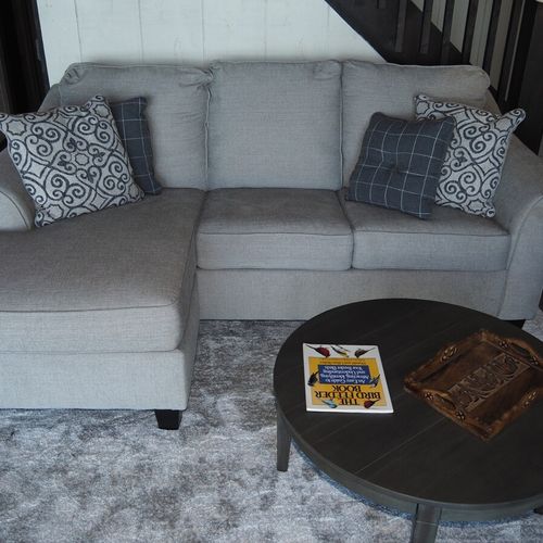 Living room:  the cottage has a cozy living room with a great view of bass lake. Includes live-streaming television with hulu, hbo max, pureflix, netflix, and disney+. (guests are not permitted to use the wood fireplace. )