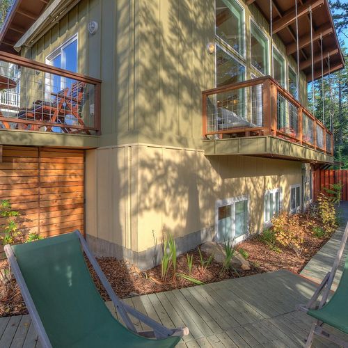 Views of the back balcony and patio off of the living room.