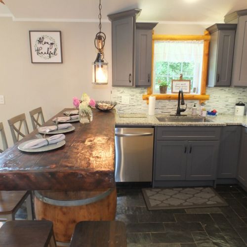 Kitchen:  another angle, highlighting the dining table, which has seats for 6.