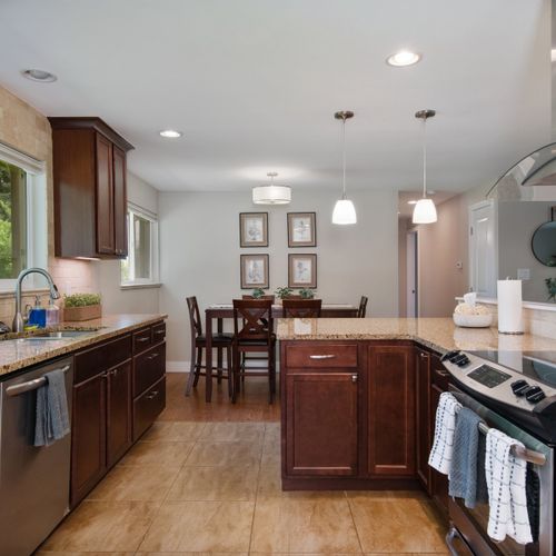 Gather around the kitchen and dining area for meals and good company.