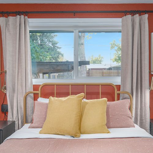 The second upstairs bedroom features beautiful decor details that reflect the stylish accents found throughout the entire home.