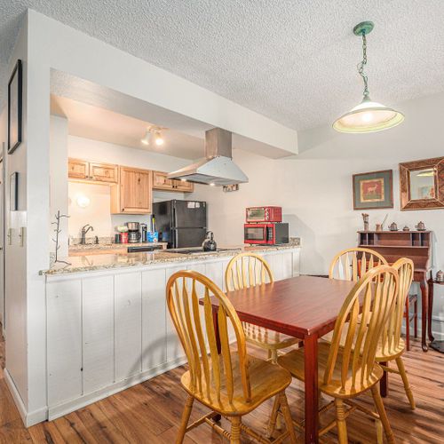 A breezy layout connects kitchen and dining—ideal for cooking, serving, and gathering with ease.