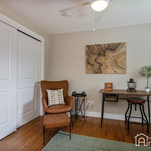 Work or relax in the private lounge area, complete with a comfortable chair and a desk for those who wfh.