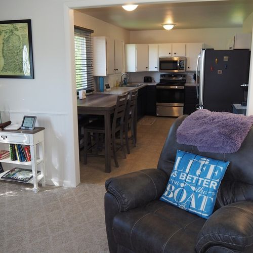 Living room:  the home has a comfy living room with new furniture and a nice view of manistee lake.