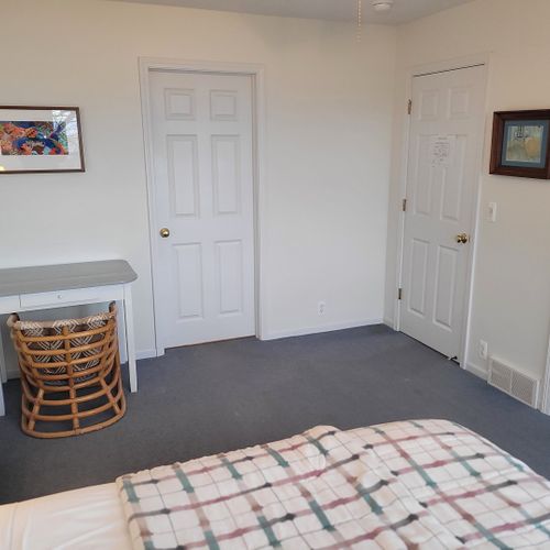 Bedroom #2 (upper level):  features a queen-size bed, great views of lake michigan, dresser, mirror, closet, desk, and private en suite full bathroom!