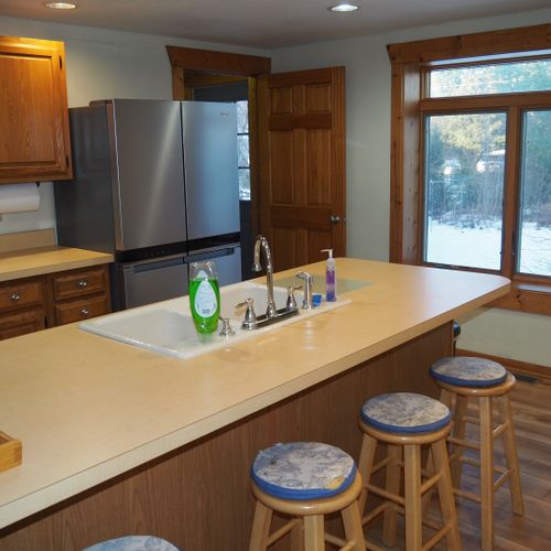 Kitchen:  newly remodeled kitchen with stainless steel appliances, including a dishwasher and microwave.