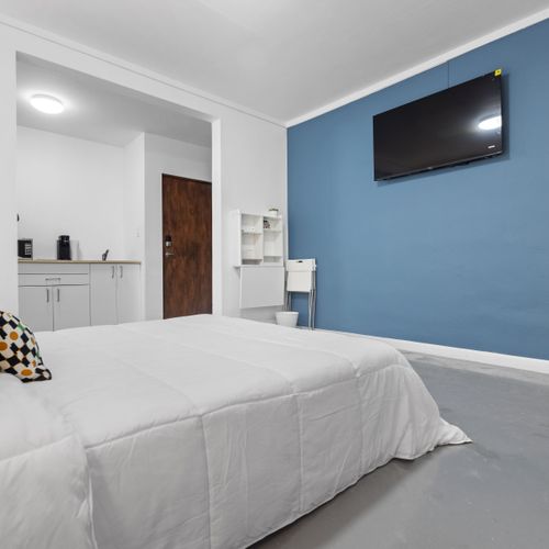 Your Restful Escape: Find your bliss in this charming bedroom, where every detail encourages you to de-stress and enjoy a peaceful night's sleep.