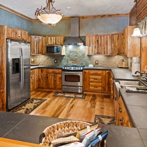Overall:  huge kitchen with all stainless steel appliances.