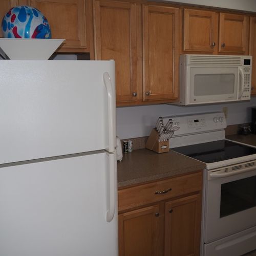 Kitchen:  the condo has a convenient and efficient full kitchen with all appliances including a dishwasher. A good collection of cooking and dining utensils is also included with the rental.