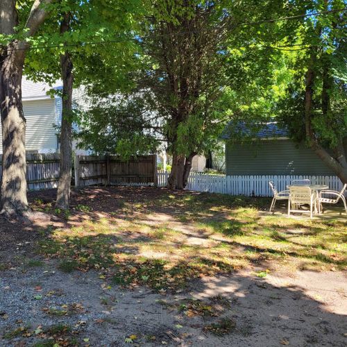 EXTERIOR:  The backyard, which includes outdoor dining