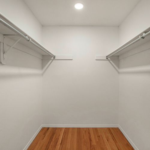 Space will never an issue in this massive master walk in closet.