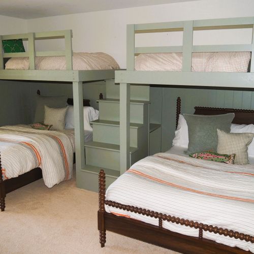 Bedroom #5 (second floor):  features two twin-on-full bunk beds, large dresser, closet, and great views of the backyard, long lake, and sleeping bear dunes.