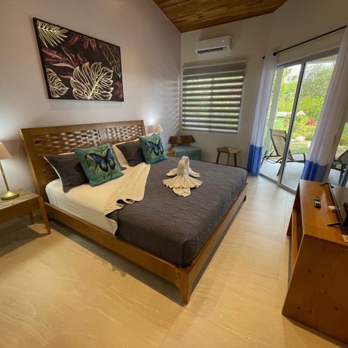 Owner's Suite has a king-size bed, 42-inch SmartTV, A/C, access to the patio and the pool and en-suite bathroom.