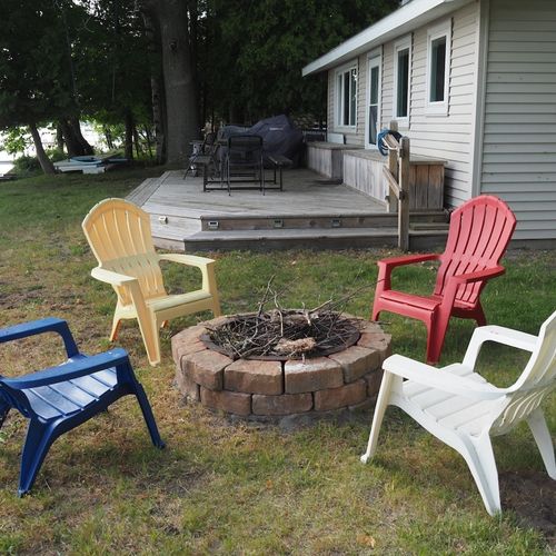 Exterior:  the outdoor bonfire ring on the lake.