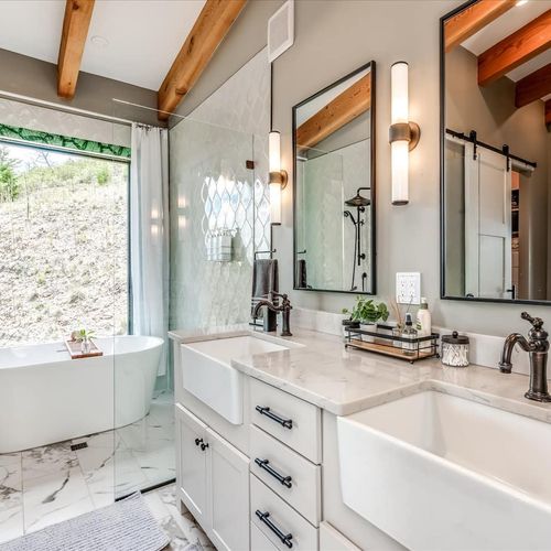 - indulge in a spa like experience with a freestanding tub and dual farmhouse sinks
- warm wood beams, marble floors, and ambient lighting create pure relaxation
- start and end your day in this stunning, thoughtfully designed retreat