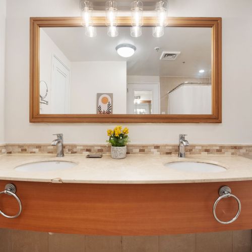 Enjoy the convenience of a generously sized bathroom, perfect for getting ready or unwinding after a day out.
