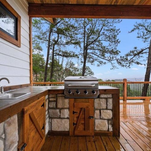 The gas grill, propane provided plus a sink and ample counter space!