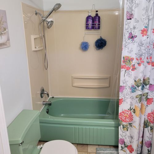 Bathroom #1 (first floor):  full bathroom on the first floor with a combination tub and shower.
