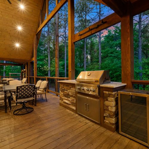 Outdoor kitchenette and dining table.