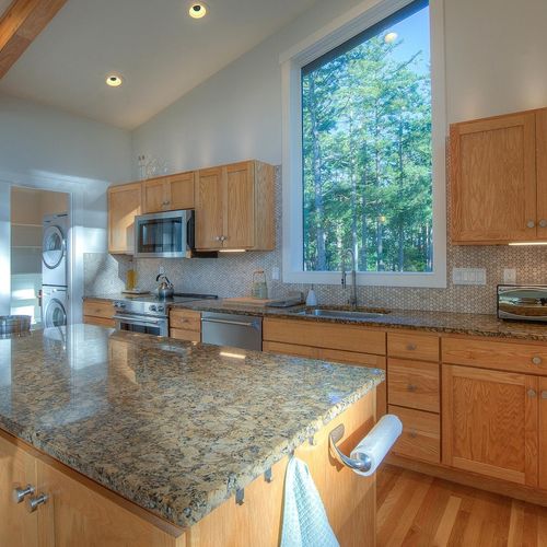 Open, bright kitchen for meals and coffee.