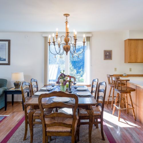 Open floor plan with dining, kitchen island, and living room area.