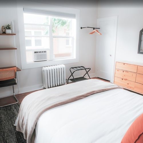 Soft bedding and blackout shades for peaceful nights.