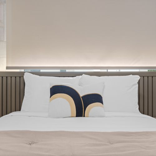 Drift off to dreamland in our cozy queen-sized bed.