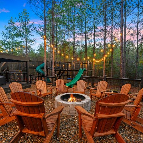 The fire pit with Adirondack chairs is a perfect place to take in the night air!