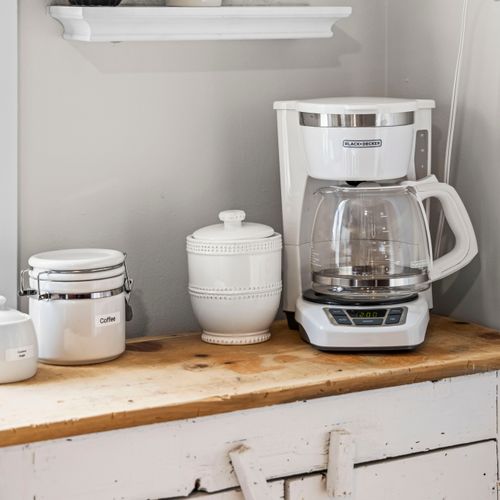Coffee station stocked and ready for your morning brew.