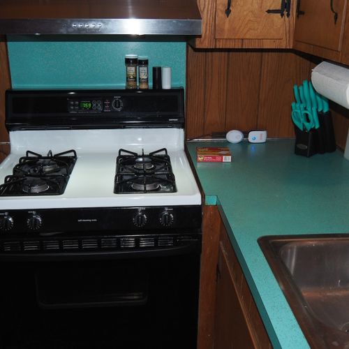 Kitchen:  the cottage has a cute little kitchen with all appliances except for a dishwasher. Includes a good supply of cooking and dining utensils.