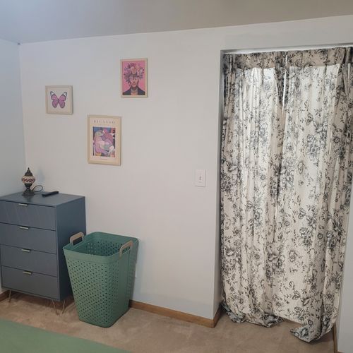 Bedroom #3:  the bedroom's closet is behind the curtains