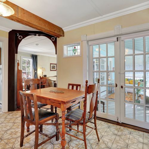 Thoughtfully connected rooms with seamless flow between kitchen, dining, and living areas.
