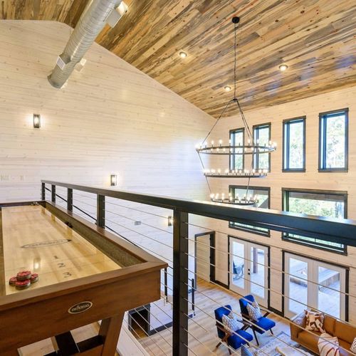 Shuffleboard, pool table and arcade console!