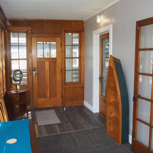 Front porch:  the home has a lovely enclosed "three seasons porch" (i. E. Unheated) that is great for morning coffee, relaxing, and reading!
