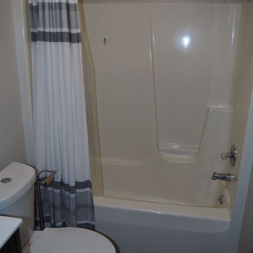 Bathroom #1 (main floor):  there's a full bathroom on the main floor near bedrooms #1 and #2.